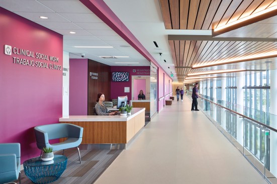 Clinical waiting area on mezzanine overlooking main concourse