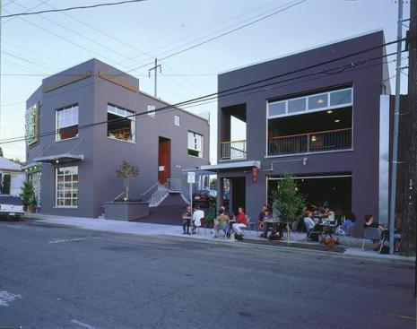 "I don't want to create something and then mask it," says Kevin Cavenaugh of the exposed rafters and concrete slab in the live/work project he designed.