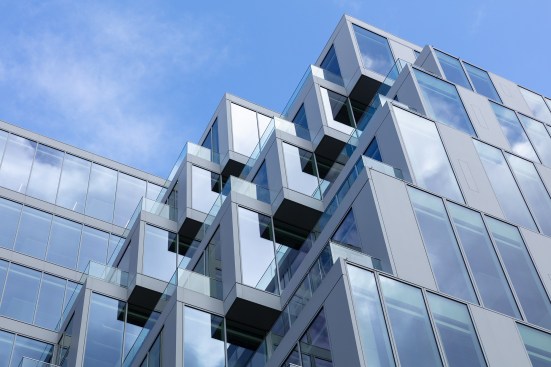 Triangular prisms were cut out on each of the building’s sides, creating canyons that widen upwards