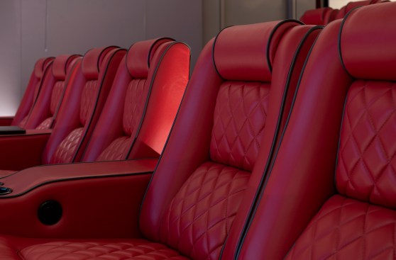 Serenity Indian Wells modern mansion luxury home theater with LED indirect lighting & Ferrari red leather chairs