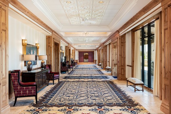 In the Pre-Function Hall outside the hotel’s banquet rooms, a thermoformed ceiling plays a contemporary role against the more traditional decor.