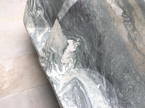 A public bench for different people.