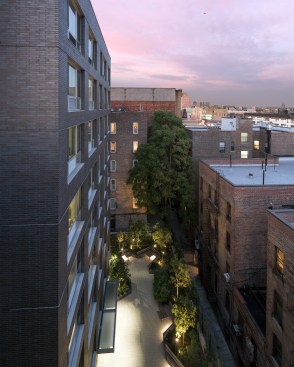 view at dusk of landscaped rear yard