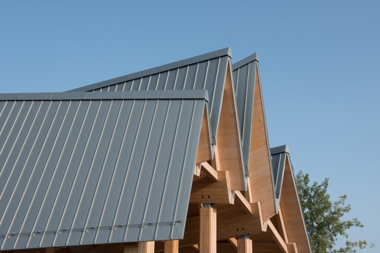 Approximately 600 m2 (6,458 square feet) of RHEINZINK prePATINA blue-grey Double Lock Standing Seam Panels clad the four sections of the steep roof.