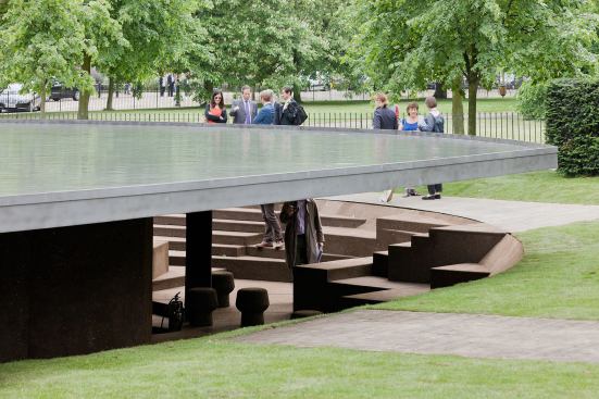 The roof collects rainwater, which can be drained into a basin beneath it for receptions and parties