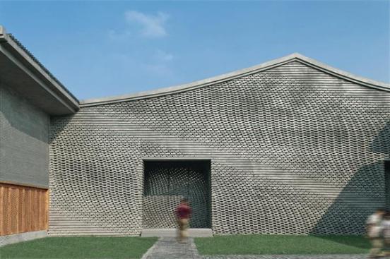 The+brick+walls+comprise+two+wythes+of+masonry+that+sandwich+the+building+columns.