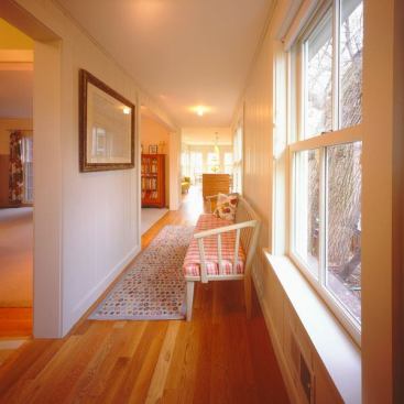 Architects: Christine Albertsson, Todd Hansen, Albertsson Hansen Architecture, Ltd., Minneapolis, MN &nbsp; The large scale and fine detailing of Marvin double-hung windows echo the tradition of the large, low-set double-hung windows that originally existed in the house. Windows, used around corners on all three levels, provide wonderful views of the creek valley.
