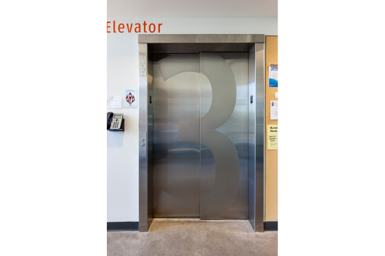 Stainless Steel Elevator Doors in Satin finish with custom Eco-Etch pattern at Clackamas Community College - Harmony Campus, Milwaukie, Oregon