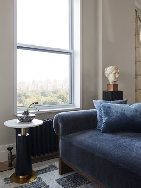 Living room with custom sofa designed by Atelier + Concept
