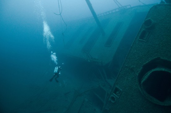 A diver explores the Green Lantern shipwreck in the Gulf of Mexico.