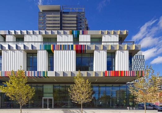 The colorful patterns on the exterior are derived from the colors of flags of the world. Regent Park has residents from 130 nations.