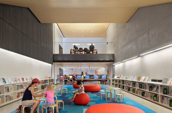 In the children's area, the sidewalls with accent lighting above, are designed to be a future pin-up surface for children's artwork.