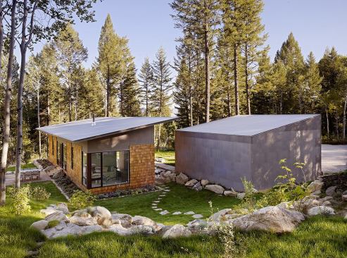 Solar panels wouldn’t have made sense for this site, which receives substantial shade. Carney and builder Kurt Wimberg focused instead on building a tight, superinsulated envelope with a high-efficiency heating system.