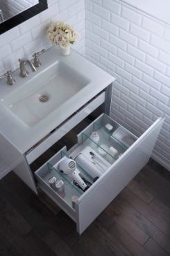 The Compact Vanity collection is designed for small bathrooms but still offers ample storage. Featuring modern styling on the outside, the unit’s standard interior components include a hanging tray and glass bin, dividers and crossbar, glass and aluminum construction, and slow-close drawers. Standard and special order colors are available. www.robern.com.