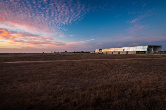 The+initial+design+challenge+was+to+fit+an+entire+college+campus+into+a+single+building%2c+going+from+a+campus+spread+over+10.5+acres+to+a+3.9+acre+site+with+an+adequete+amount+of+parking+spaces.