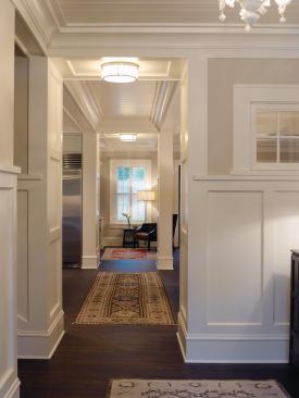 "The scale of the pieces and parts is so important," says architect Jean Rehkamp Larson. Case in point: the home's well-detailed entry foyer.