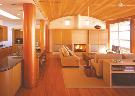 Barrel-vault roofs lend a spacious feeling to the interiors, including the living room.