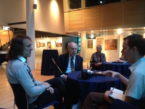 An interview with Simo "Sipe" Santapukki (left) and Eric Lloyd Wright (center) at the Embassy of Finland.