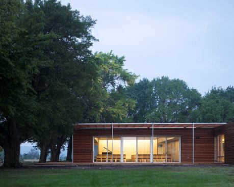 The Unitarian Fellowship of Lawrence is located in a century old hedge grove in rural Kansas. The natural scenic location and relationship between exterior and interior influenced the architecture and lighting design.