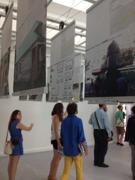Inside the pavilion, visitors can see the 124 projects that are featured in the 
Spontaneous Interventions exhibit. Each intervention is featured on a banner that can be pulled down from the ceiling for a closer read.