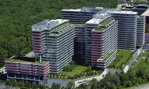 In part as a nod to an adjacent forest preserve, and in part to offset the urban heat island effect, the Old Orchard Woods complex makes liberal use of green roofs. Visible at multiple levels, the main green space on the fourth floor is accessible to residents and serves as a private 1.2-acre park. All of the green roofs use American Hydrotech assemblies the system on the higher levels has sedum, grasses, and herbs and requires no maintenance, whereas the system on the fourth floor needs to be regularly maintained and allows for trees and other plants that have deeper root networks.