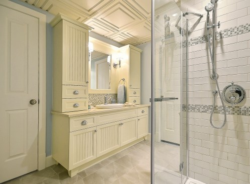 Because thermoformed ceiling tile are impervious to moisture, they are an excellent choice for wet environments like bathrooms.