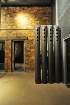 Conditioned air is supplied though vertical stacks - these are expressed architecturally