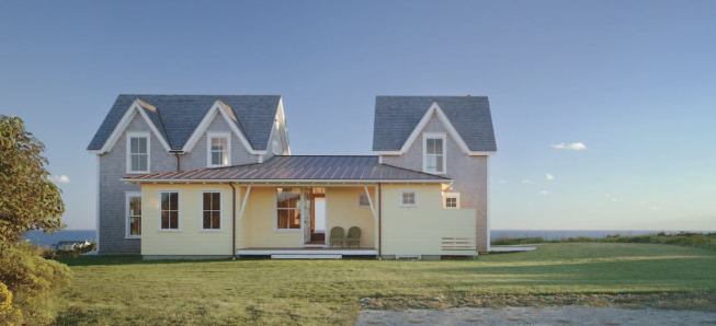 The low-slung massing that ties the house together starts at the front entry.