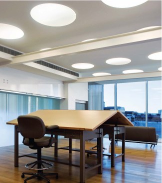 Comfortable artist-in-residence quarters connect to four upper-level private studios.