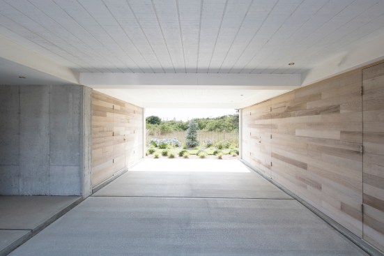 Ground level parking and storage below the house.