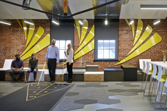 The+open+co-working+space+features+a+full%2c+built+in+shuffleboard