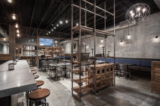 The interiors of the space were inspired by the scaffolding seen throughout the ever-evolving New York City streets. This industrial element made usually of wooden planks and metal poles has been repurposed into the space in a functional, yet aesthetic way.&nbsp;&nbsp;