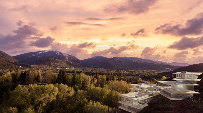 Expansive floor to ceiling glass windows create an experience of the cantilevered terraces, exterior views and interiors as one integrated space.