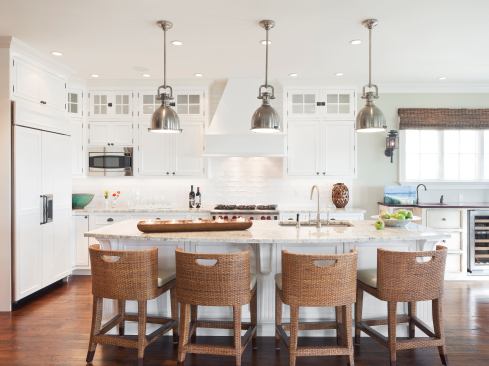 The clean and classic kitchen in this beachside house takes its cues from the natural and man-made elements of its shoreline location. Location: Silver Beach, N.J. Architect: Richard Bubnowski. Interior Designer: Elizabeth Gillin. Builder: Brian Furey, Falcon Industries.