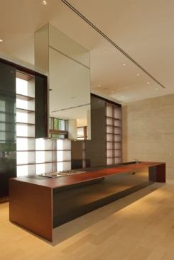 Like the home itself, the large kitchen is marked by a minimalist design aesthetic.