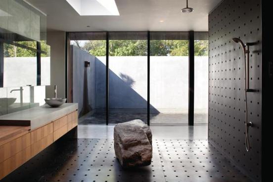 The master bath, with an outdoor shower beyond.