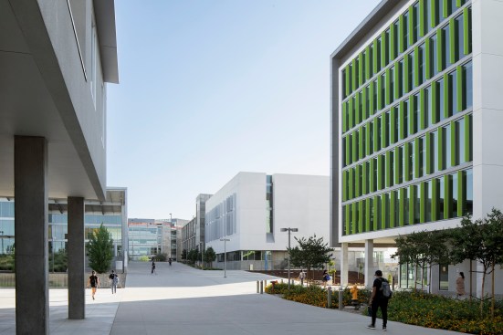 A simple materials palette of concrete, cement plaster, glass, and metal panels help the building relate to its new neighbors while allowing for a distinct aesthetic expression.
