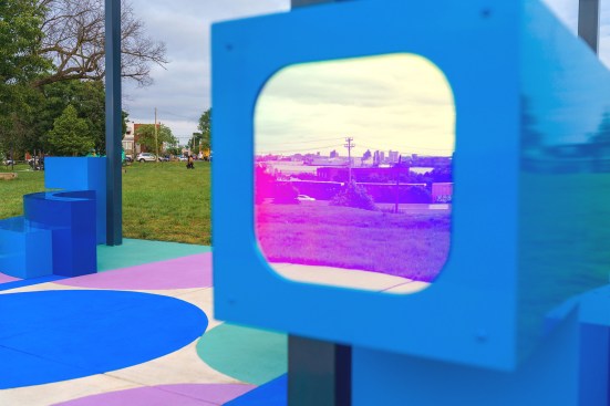 At the end of each bench system are portals reflecting different views of the neighborhood.