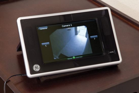 The completely wired home allows owners to control the HVAC system and access video surveillance of the front door all from their smartphone.
