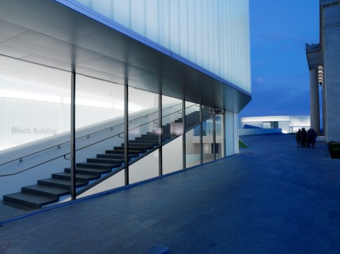 The lit boxes of the new Block Building provide luminescence to the sculpture court.
