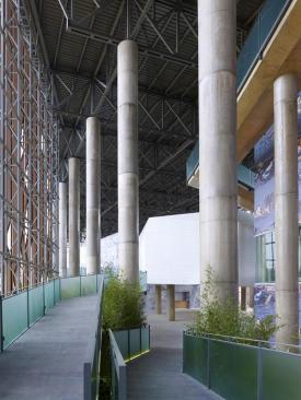 Gardens along with stone and concrete walkways line the perimeter inside the cultural center.