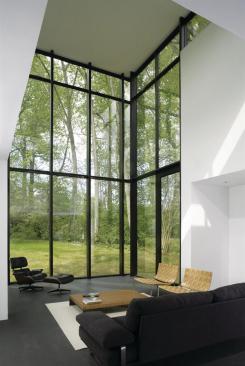 The ground floor features dark radiant heated Ardex expoxy floors.