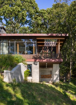 Cantilevered porch supported by a board formed concrete pier
