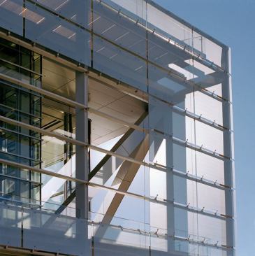 A solar screen reduces interior solar gain, while temperatures are mitigated by demand-controlled ventilation and radiant floors.