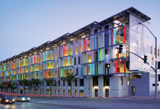 Seen from California Interstate 10, the Santa Monica Civic Center parking structure serves as a gateway to the city with its colorful façade treatment.