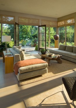 A courtyard garden extends the living room and overlooks river rapids 60 feet below.