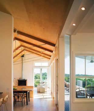 Simple materials and details further the aim of a carefree summer place.