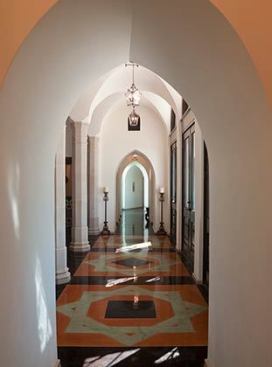 Dos Suenos, San Antonio, Texas – vaulted hall connecting triple entry doors to living room