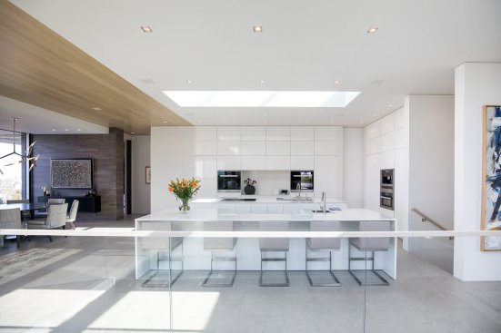 Modern Beverly Hills home with bright, open plan kitchen and skylight.