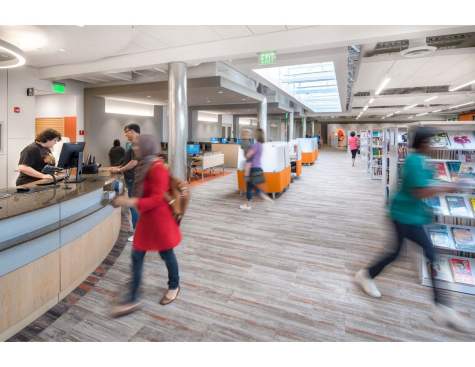 View of service desk and study pods under new skylights